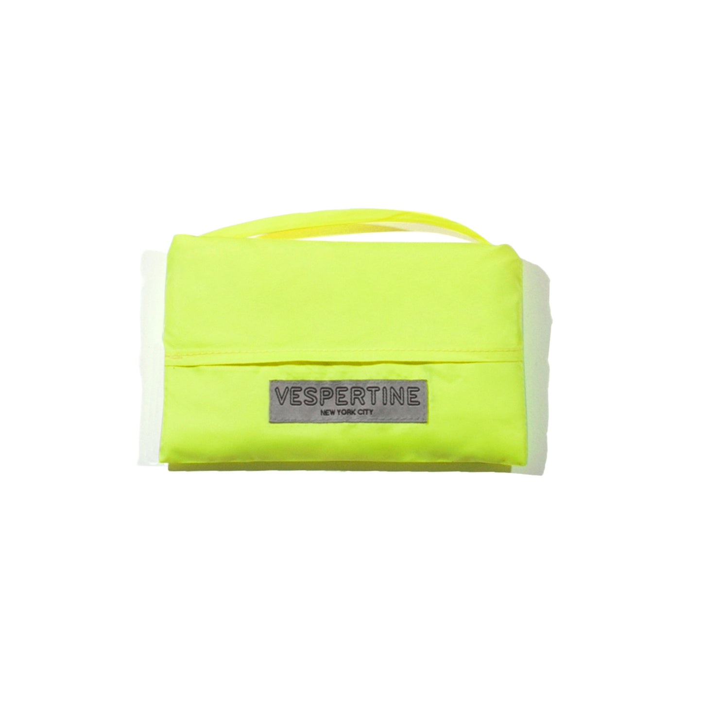 shown in pouch vespert eco citron neon yellow stylish reflective vis safety vest reflecting clothing high visibility gear accessory women fashion bike walk run dog walking walker night sustainable nighttime bright 3M scotchlite made in NYC USA