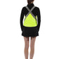 seen from behind model wears vespert eco citron neon yellow stylish reflective vis safety vest reflecting clothing high visibility gear accessory women fashion bike walk run dog walking walker night sustainable nighttime bright 3M scotchlite made in NYC USA
