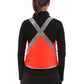 model seen from behind wearing cute vespert eco flame neon orange stylish reflective hi vis safety vest for women reflecting clothing high visibility gear accessory womens fashion bike ebike cycling walk run running dog walking walker night sustainable nighttime bright made of eco-circle recycled polyester and 360 3M scotchlite material in NYC USA designed to be seen day and night packable